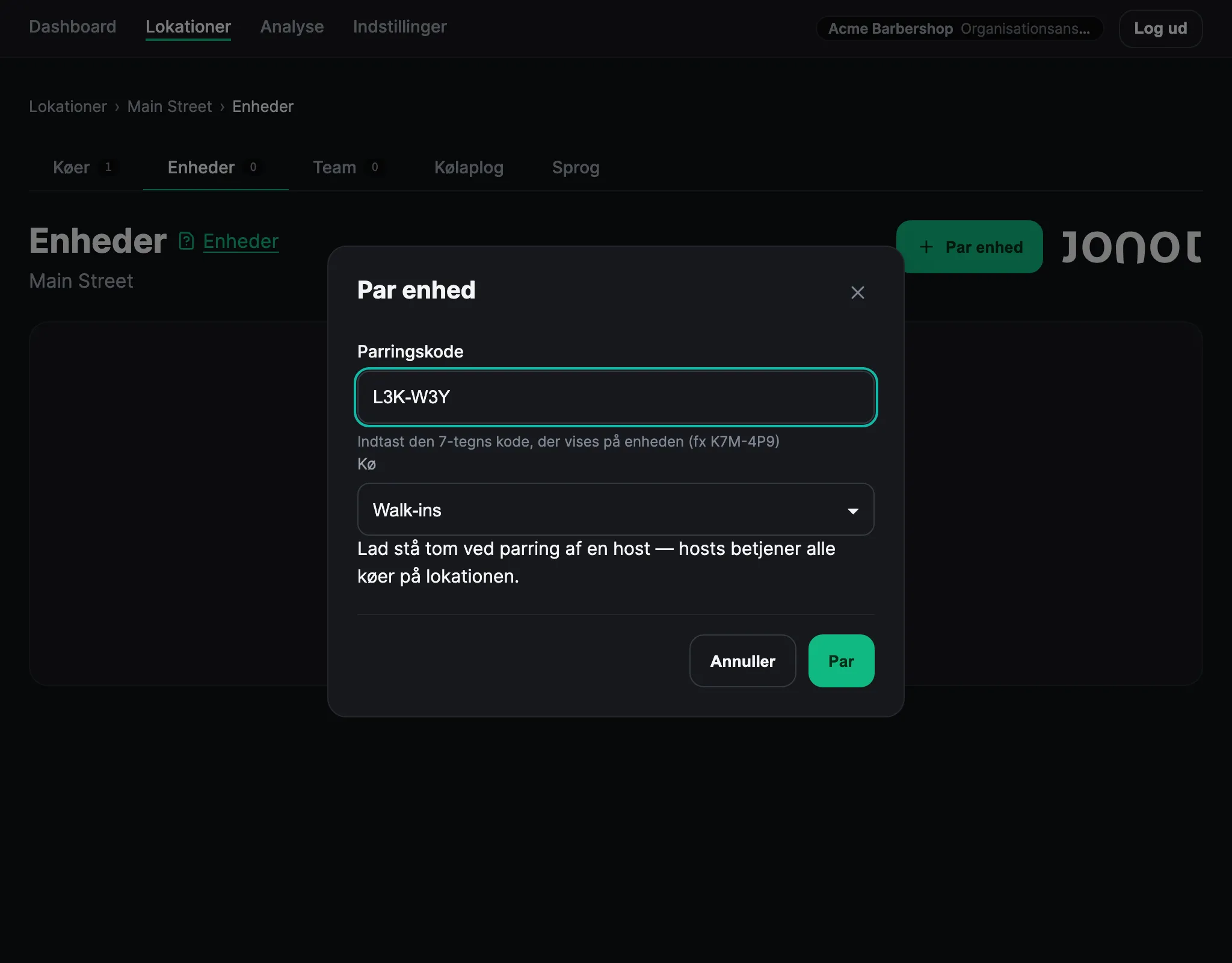 Dialogen til enhedskobling i Jonots admin-dashboard med koblingskoden indtastet og en kø valgt