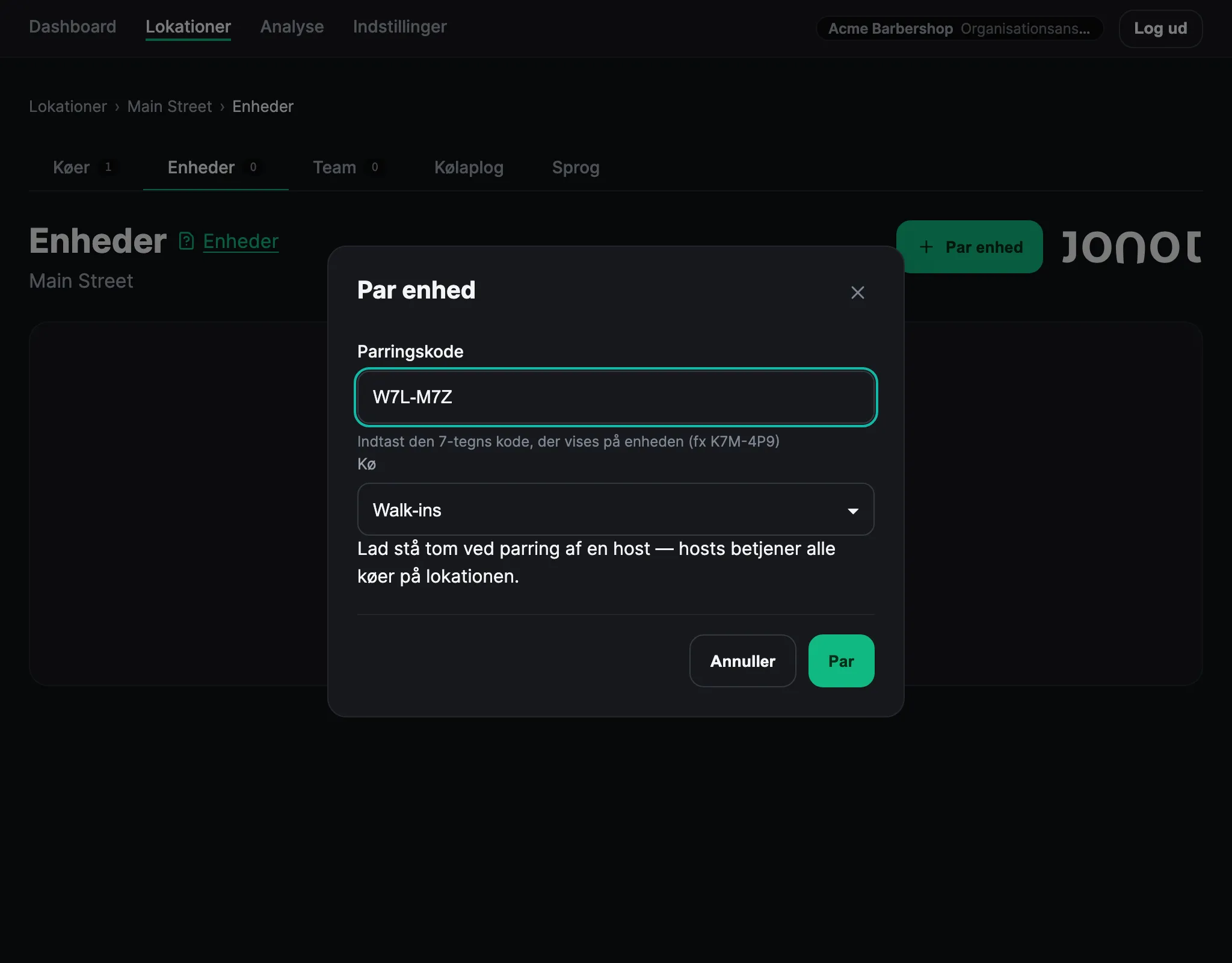 Dialogen til enhedskobling i Jonots admin-dashboard med koblingskoden indtastet og en kø valgt