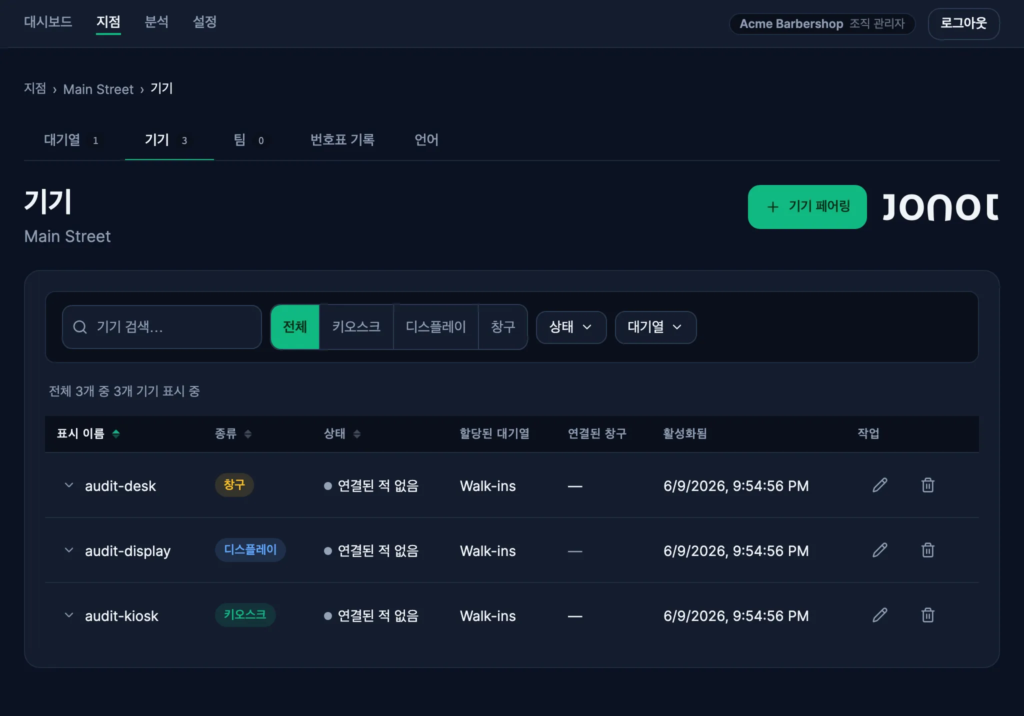 Device management page in the Jonot admin dashboard showing desk terminal pairing